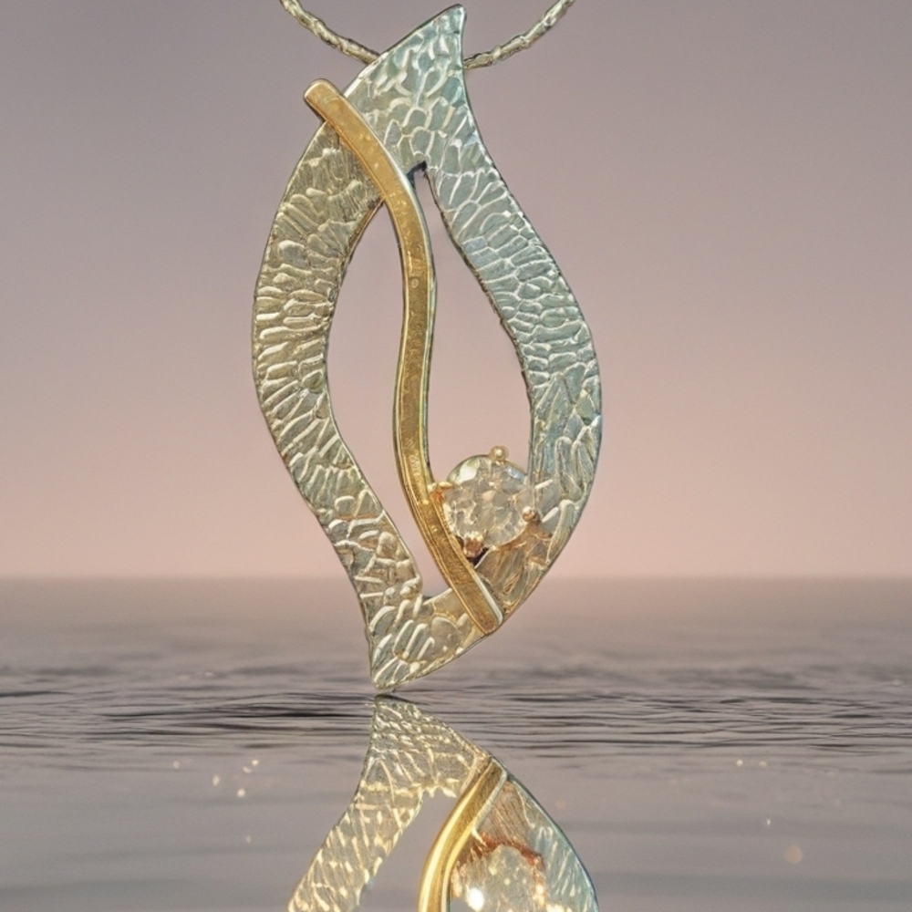 Gold and Silver Textured Necklace with Abstract Pendant